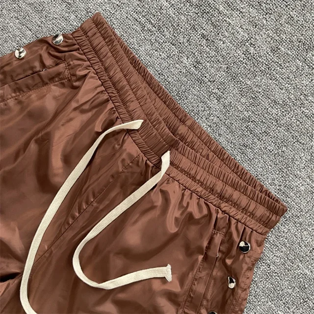 Saint Vanity Shorts Drawstring with embroidered patch and side rivets product detail image 11