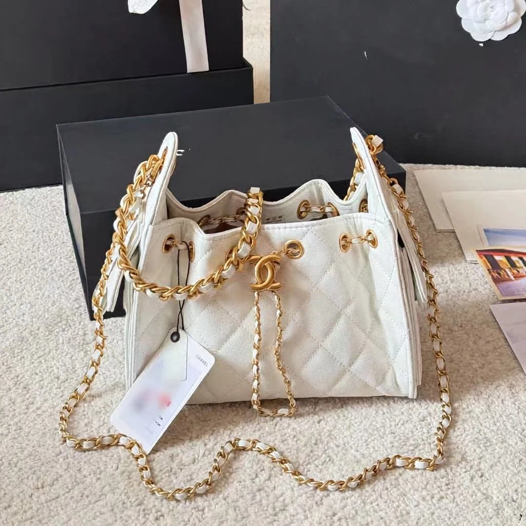 Chanel Shoulder Bags Quilted drawstring chain bag — Mini White