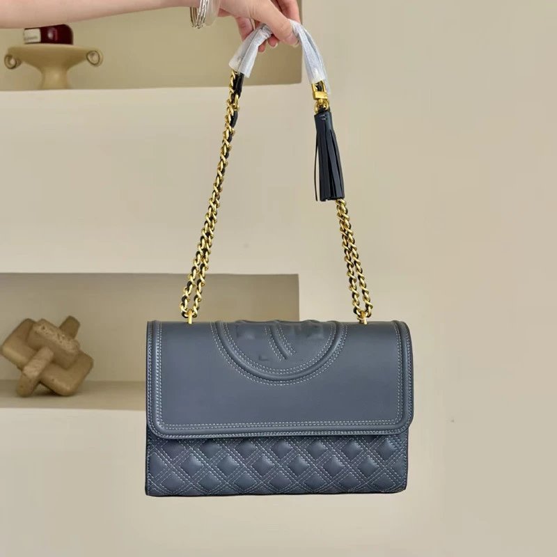 Tory Burch Shoulder Bags Quilted flap bag with chain strap and tassel — gray