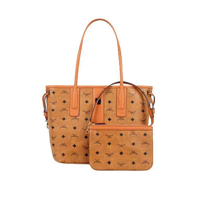 MCM Handbags Visetos tote with detachable pouch — Cognac color