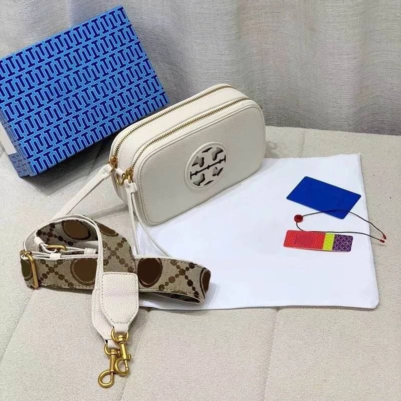 Tory Burch Crossbody Bags Small double-zip logo camera bag with adjustable wide strap — white