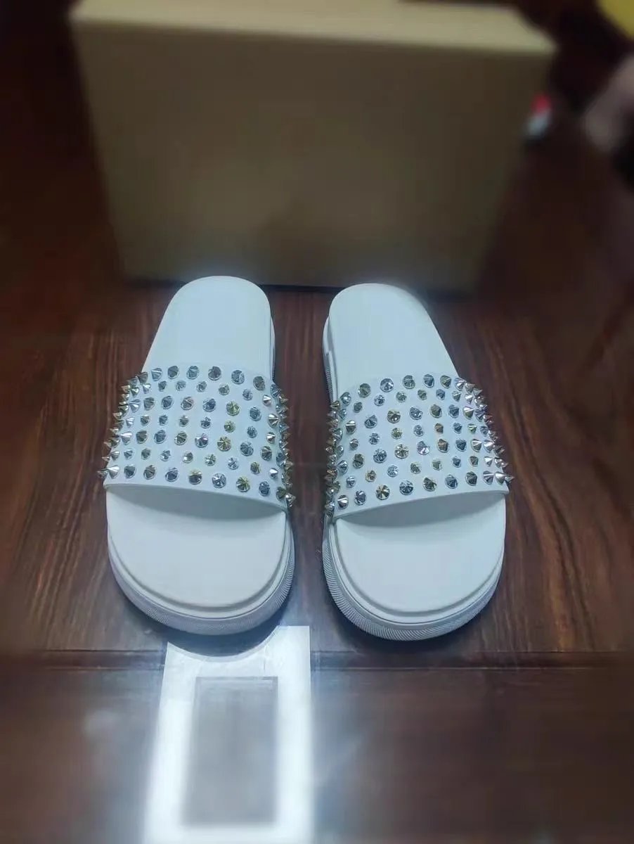 Christian Louboutin Slippers Spiked slide and thong — 18