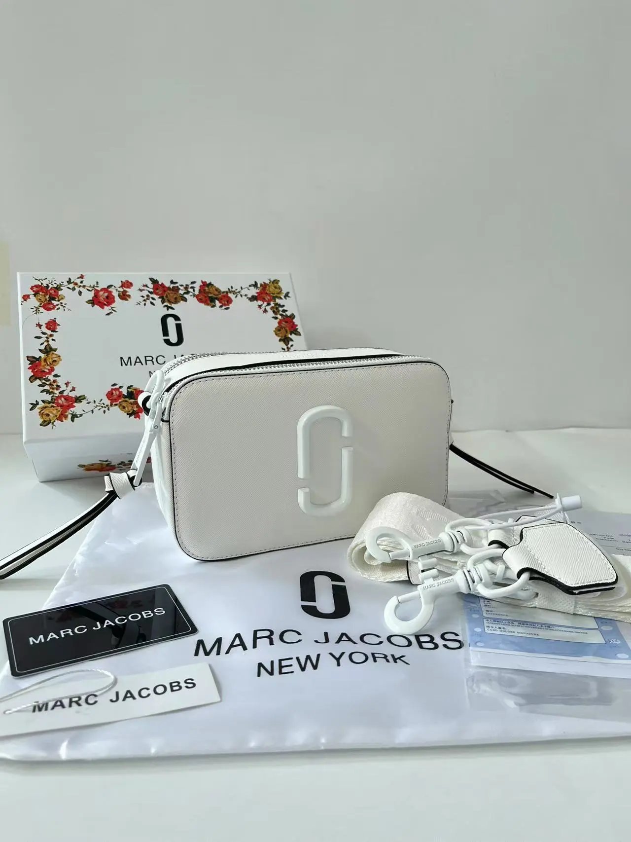 Marc Jacobs Crossbody Bags Snapshot camera bag with double-J hardware and wide logo strap — White spray paint