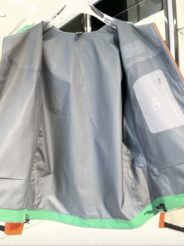 Arc'teryx Jackets Hooded color-block shell jacket with zip pockets product detail image 6