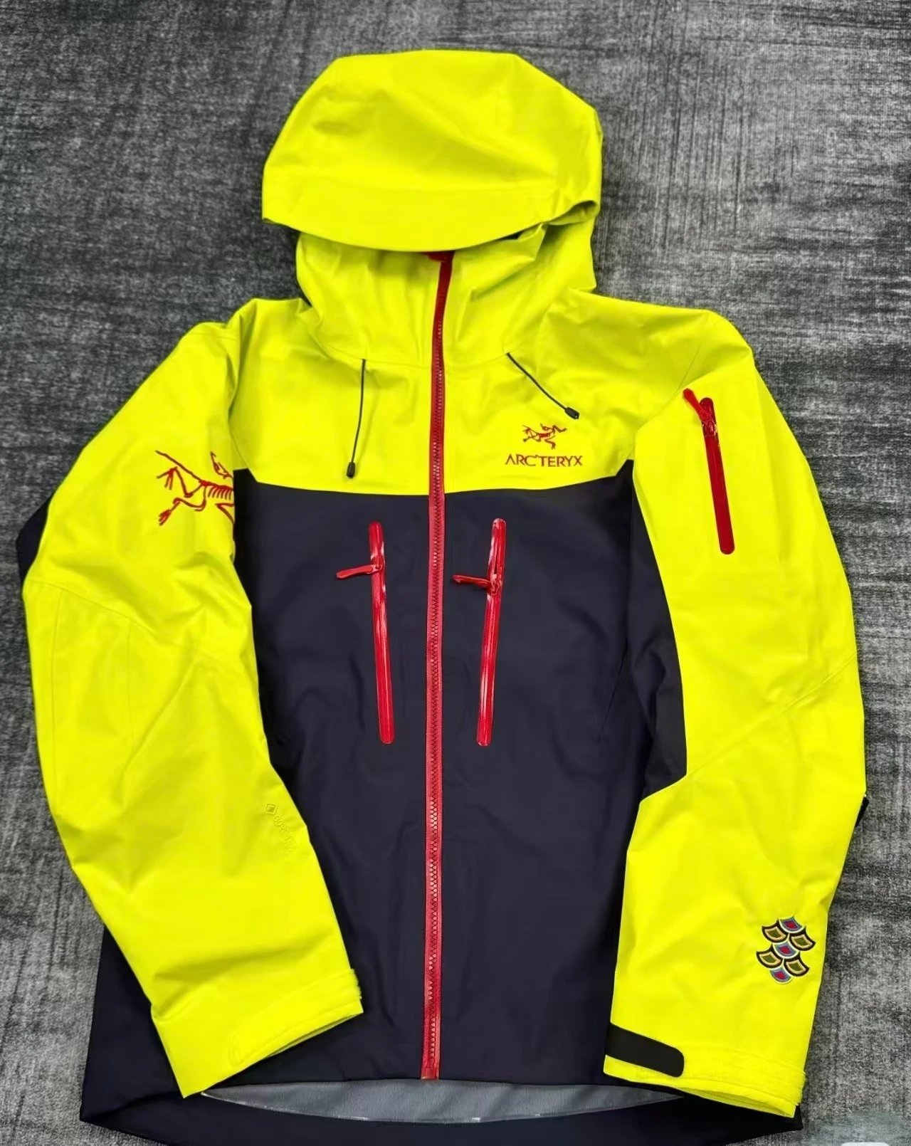 Arc'teryx Jackets Hooded color-block shell jacket with zip pockets — Dragon Year Limited Edition