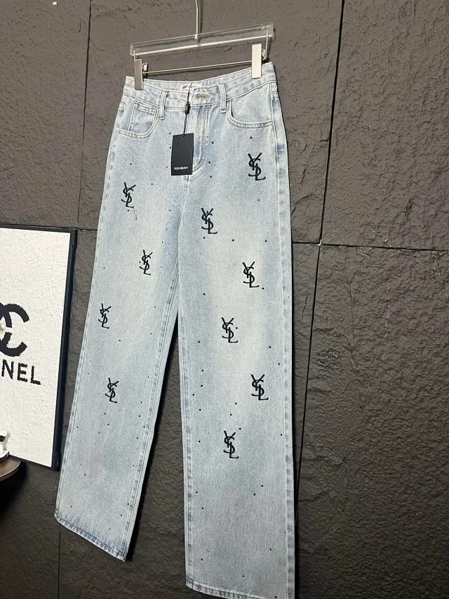 Yves Saint Laurent Jeans Light-wash high-rise wide-leg with all-over YSL monogram embroidery and stud embellishments product detail image 2