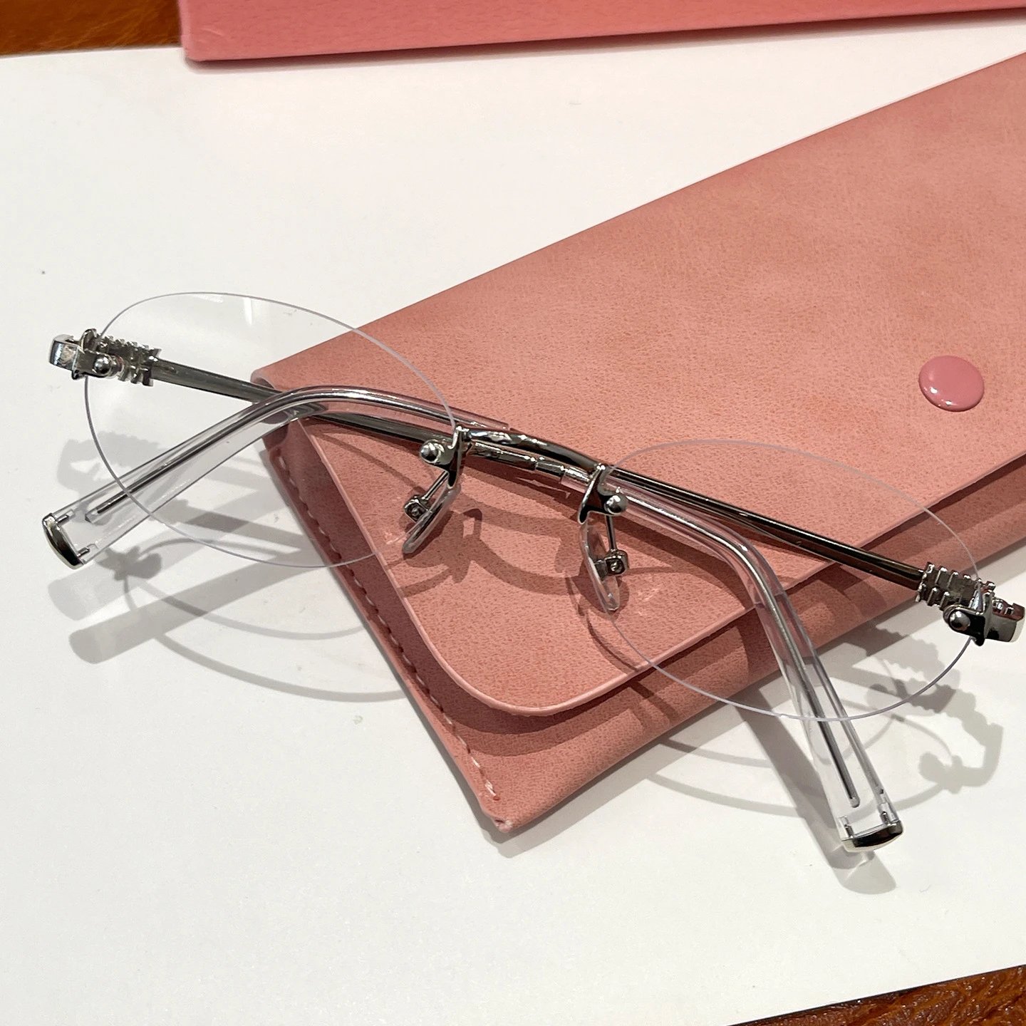 Unbranded Eyewear EF63008 Rimless Oval Glasses — Silver frame, white lens