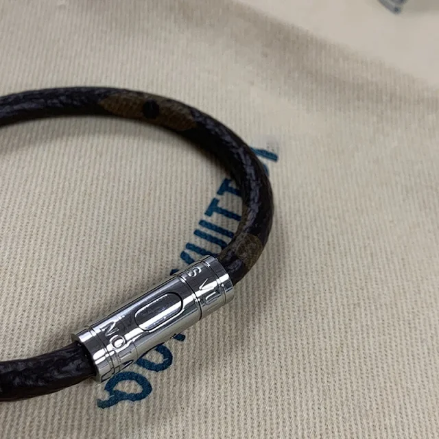 Louis Vuitton Jewelry Monogram canvas cord bracelet with cylindrical clasp product detail image 3