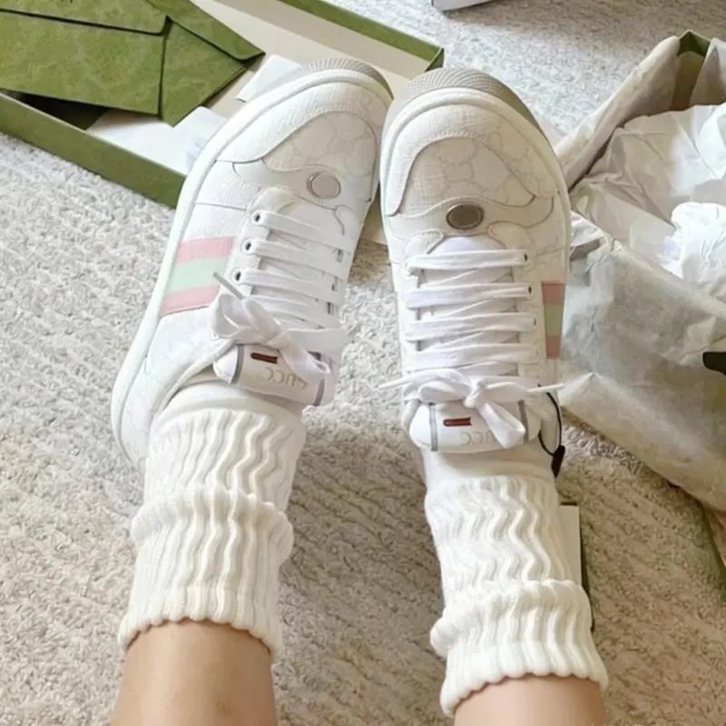 Gucci Sneakers Screener low-top lace-up with Web stripes and GG pattern panels — milky white