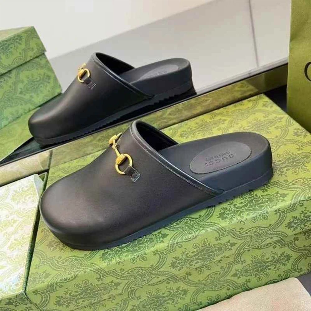 Gucci Slippers GG Monogram Horsebit Mules — Black leather surface