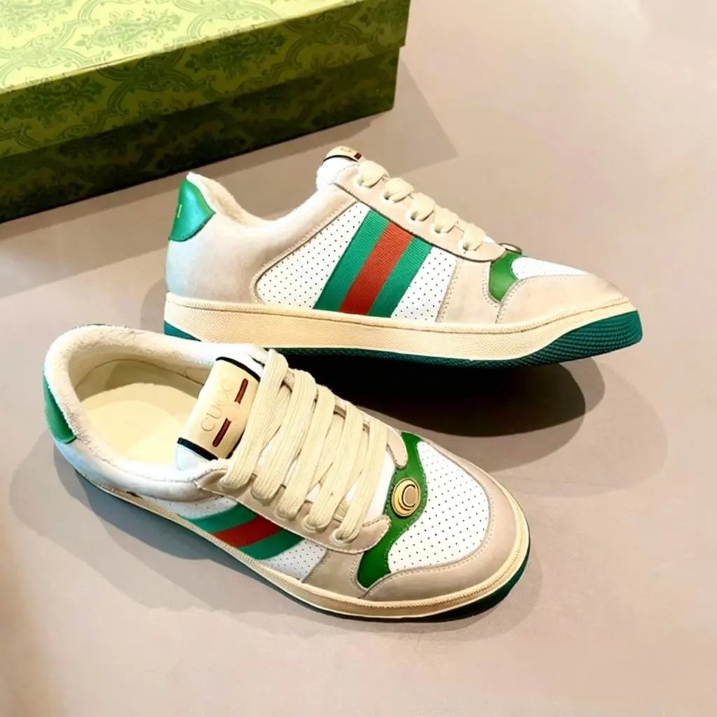 Gucci Sneakers Screener low-top lace-up with Web stripes and GG pattern panels — White leather perforated