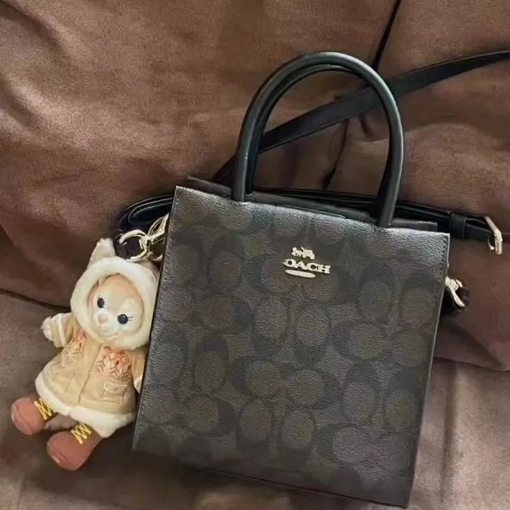 Coach Crossbody Bags Mini Signature Canvas Top-Handle image 1