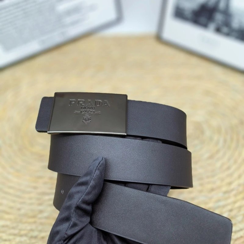 Prada Belts Saffiano-textured belt with rectangular logo buckle — Flat grain gun buckle