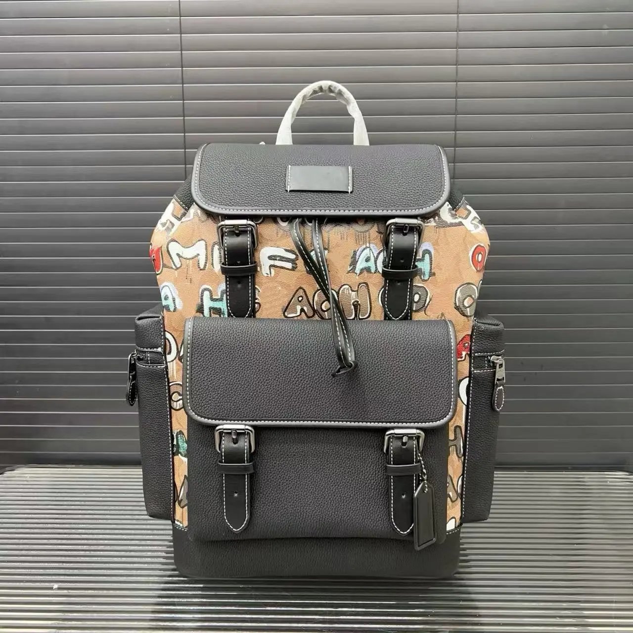 Coach Backpacks Flap backpack with buckle straps and front pocket — Style 10