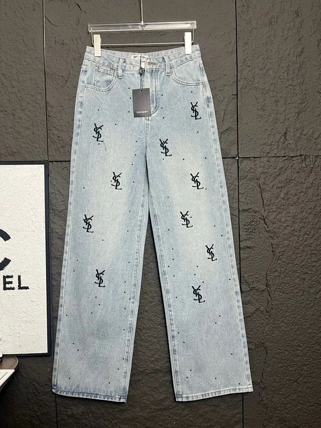 Yves Saint Laurent Jeans Light-wash high-rise wide-leg with all-over YSL monogram embroidery and stud embellishments product detail image 1