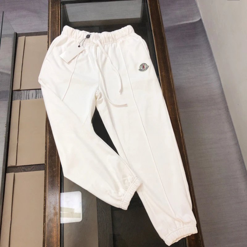 Moncler Trousers Drawstring jogger sweatpants with logo patch — Milky white YCK1SM 007
