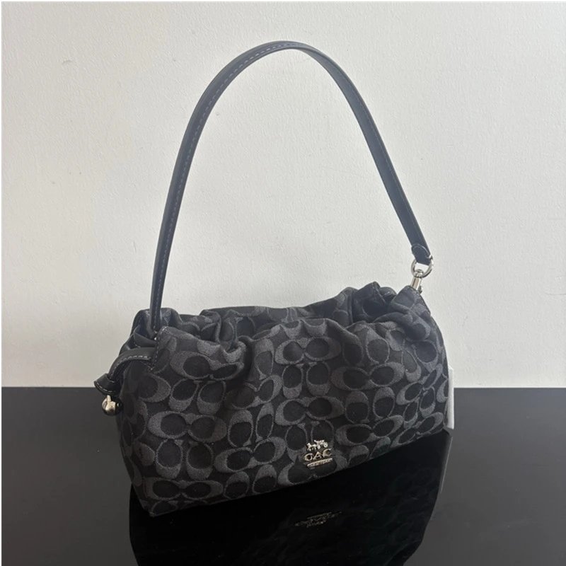 Coach Signature C canvas drawstring bag — large tannin black