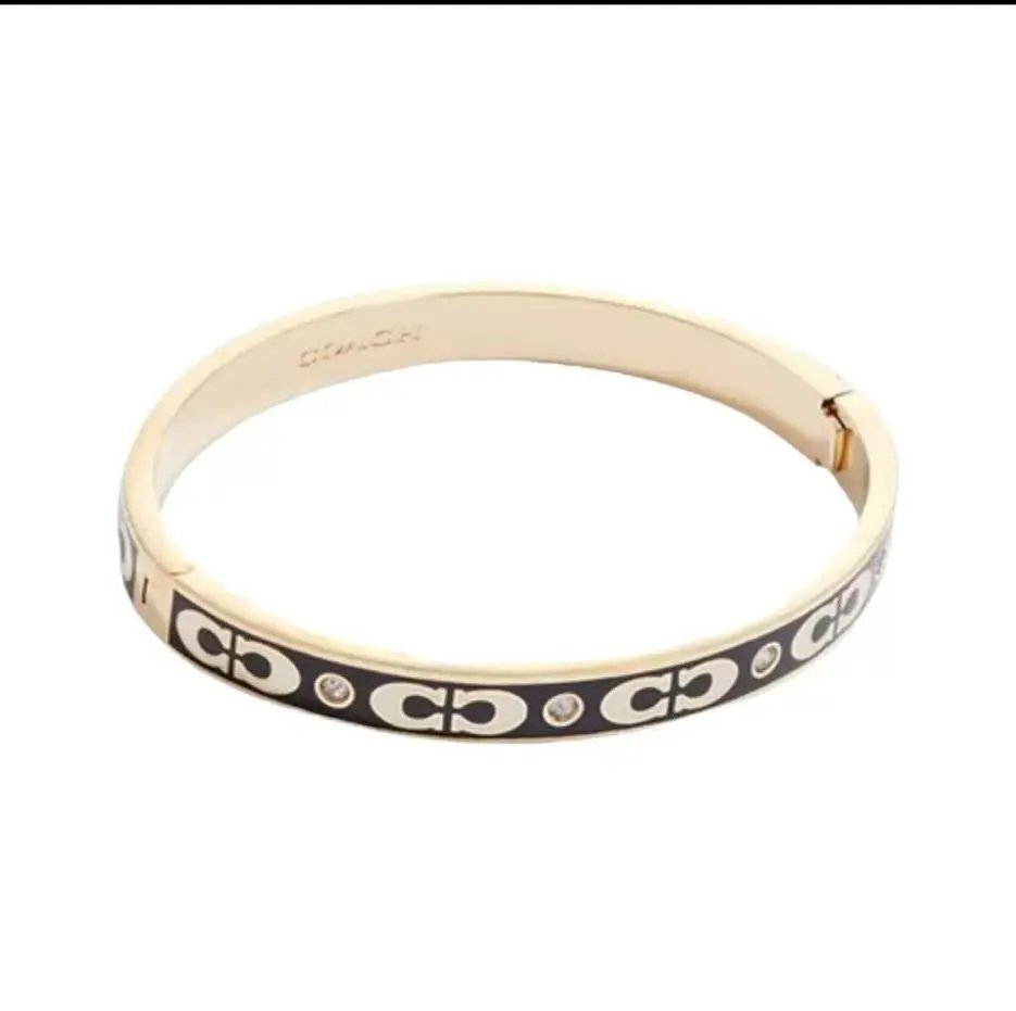 Coach Jewelry Signature C Hinge Bangle Bracelet — Gold and Black Enamel Bracelet