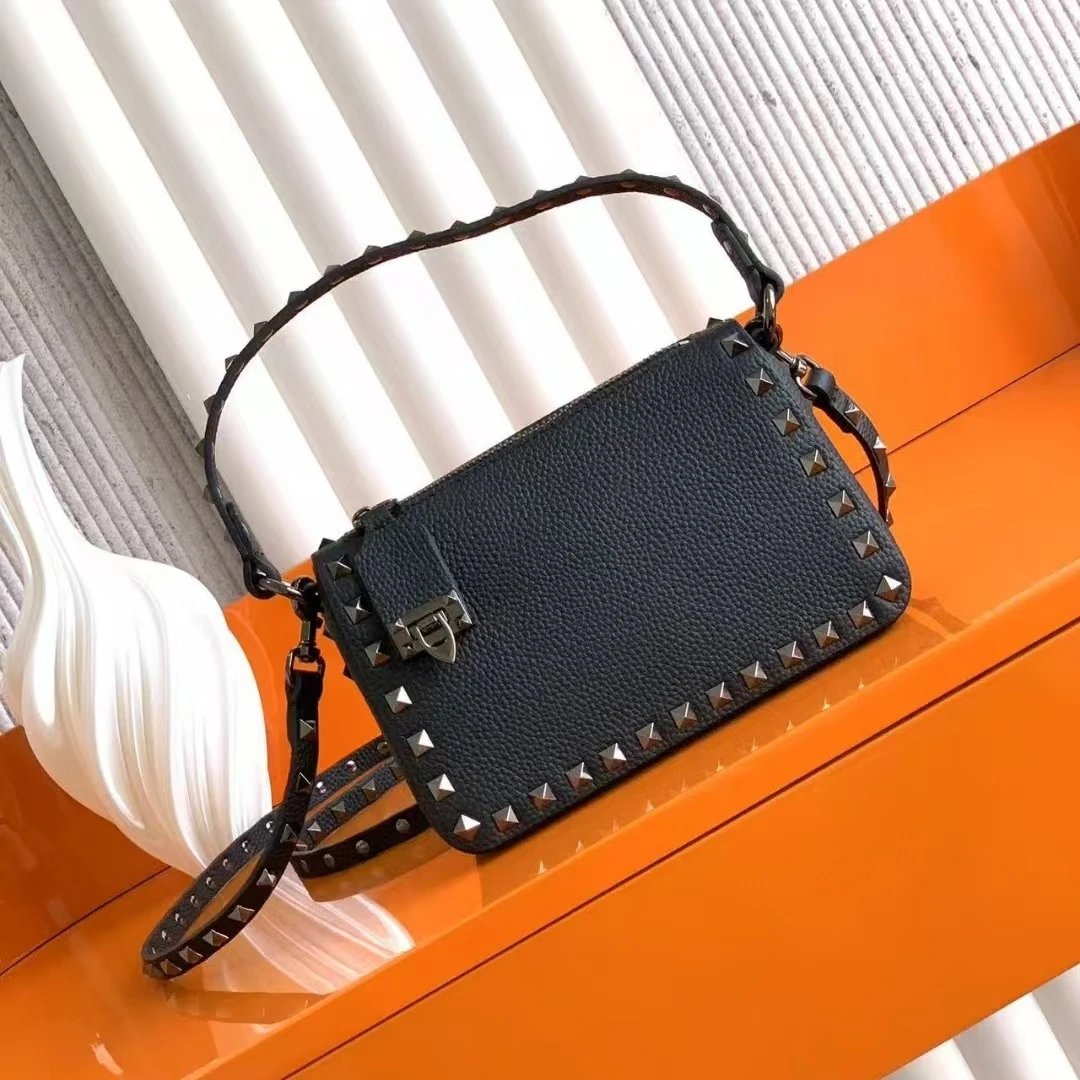 Valentino Garavani Crossbody Bags Rockstud small leather bag — Gunmetal black