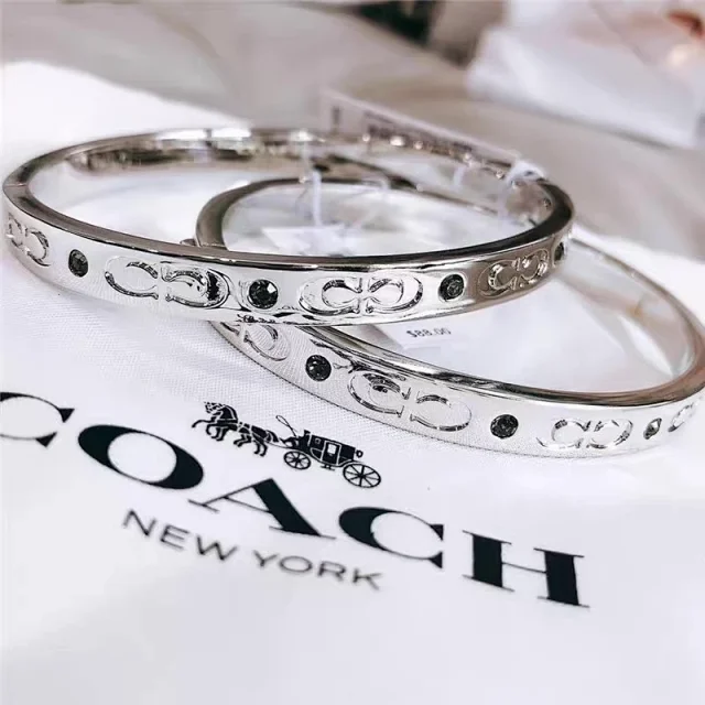 Coach Jewelry Signature C Hinge Bangle Bracelet product detail image 1