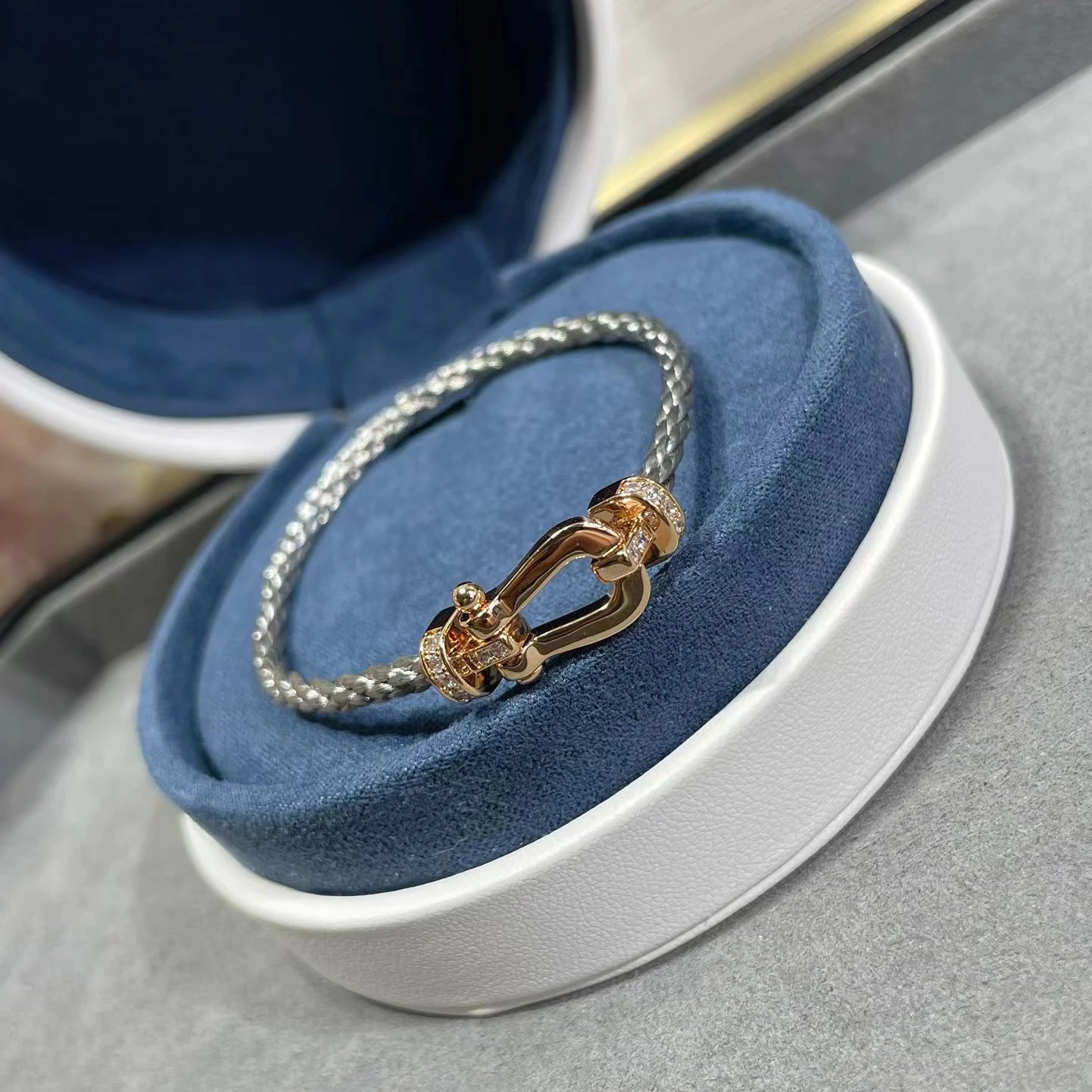 FRED Jewelry Force 10 braided cord buckle bracelet — Medium-sized rose gold half-diamond gray steel rope