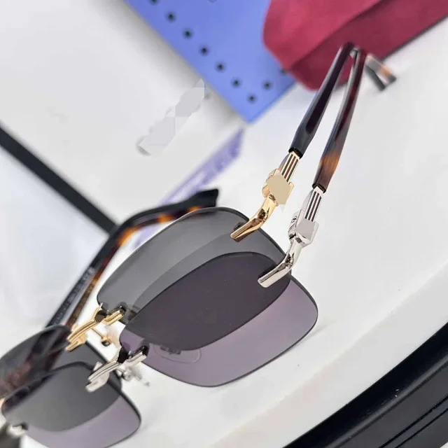 Unbranded Eyewear Rimless rectangular sunglasses with decorative metal temples product detail image 18