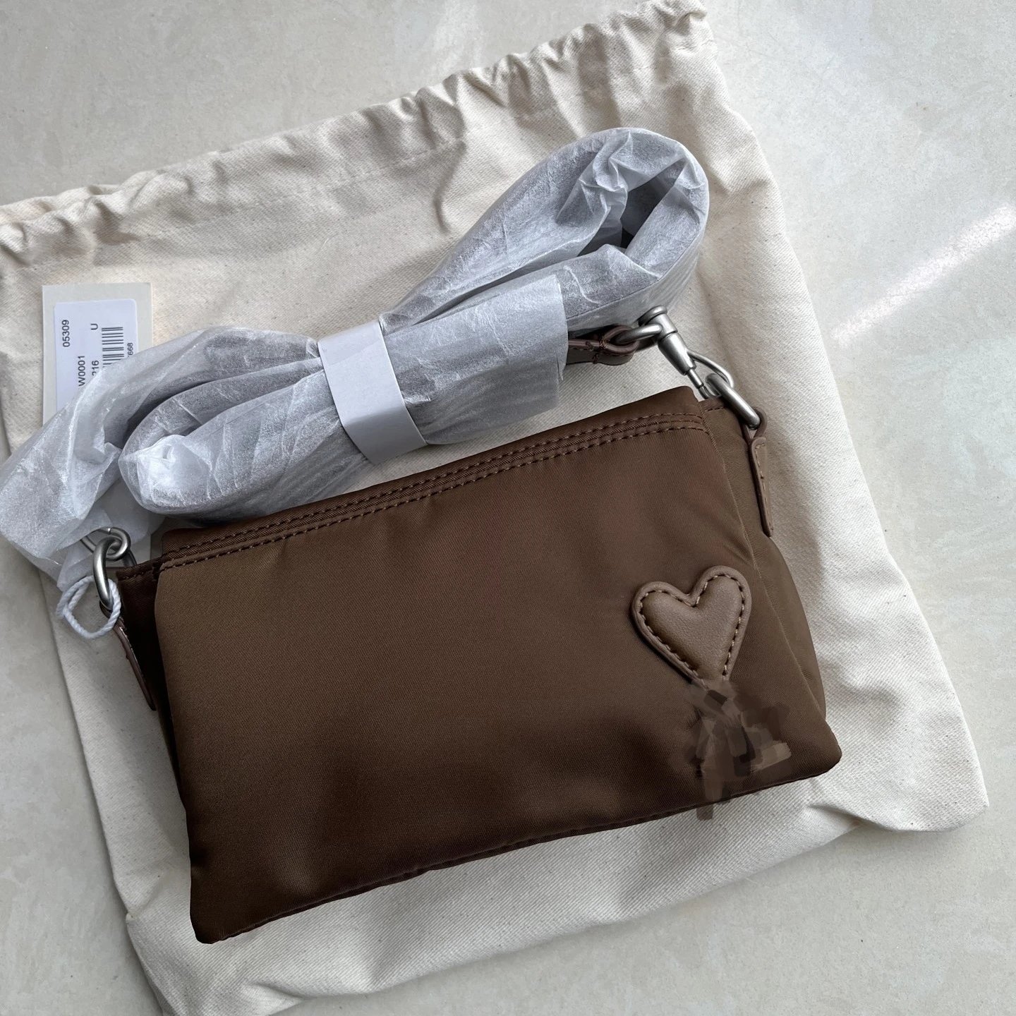 AMI Paris Crossbody Bags Nylon bag with heart patch and wide adjustable strap product image