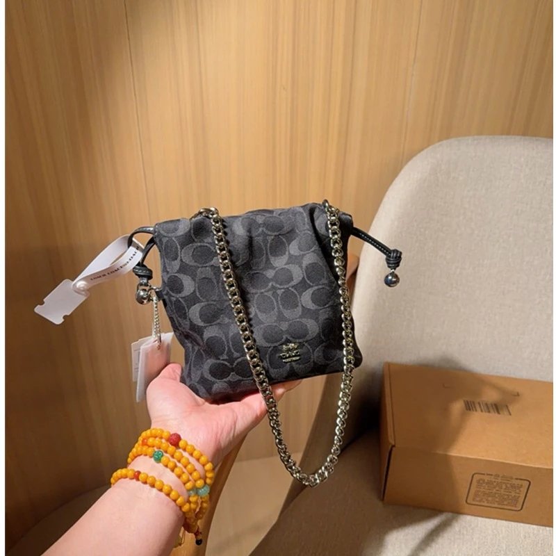 Coach Signature C canvas drawstring bag image 2