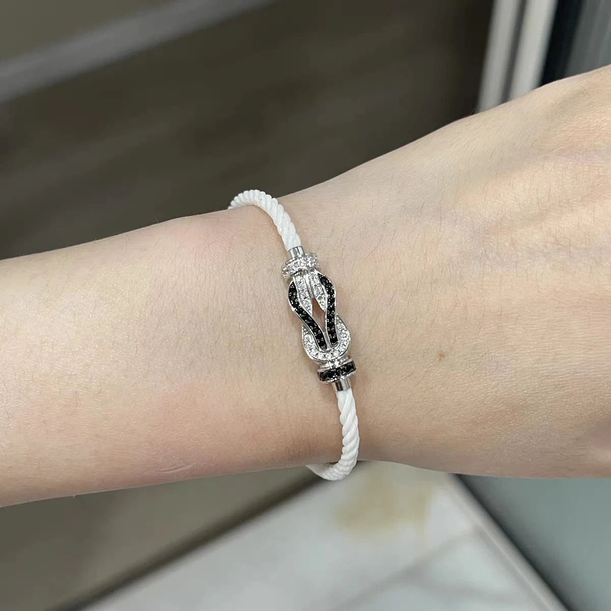 FRED Jewelry Force 10 braided cord buckle bracelet — Medium-sized figure-eight clasp, platinum panda, white rope