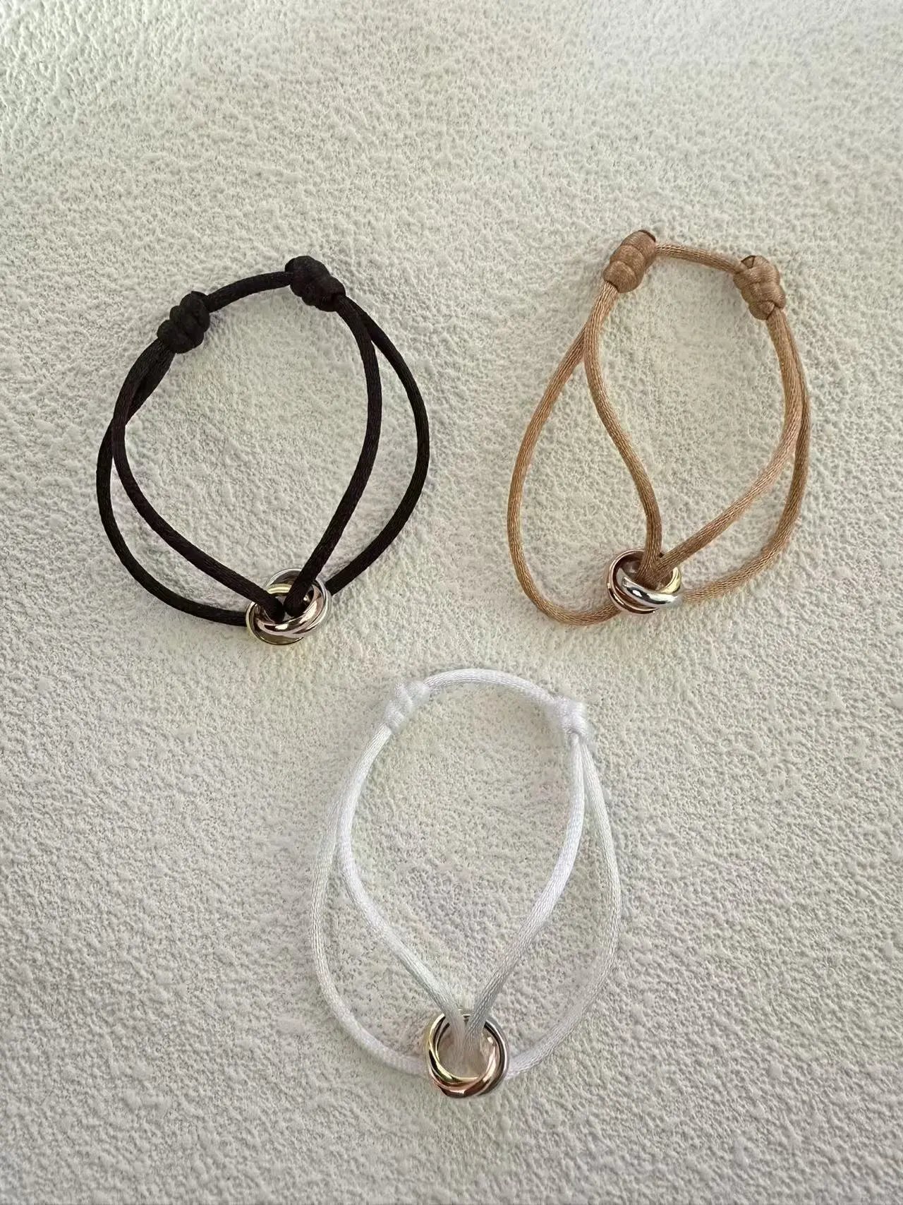 Unbranded Jewelry Adjustable Cord Bracelet with Three Interlocking Rings — Coffee (dark brown)