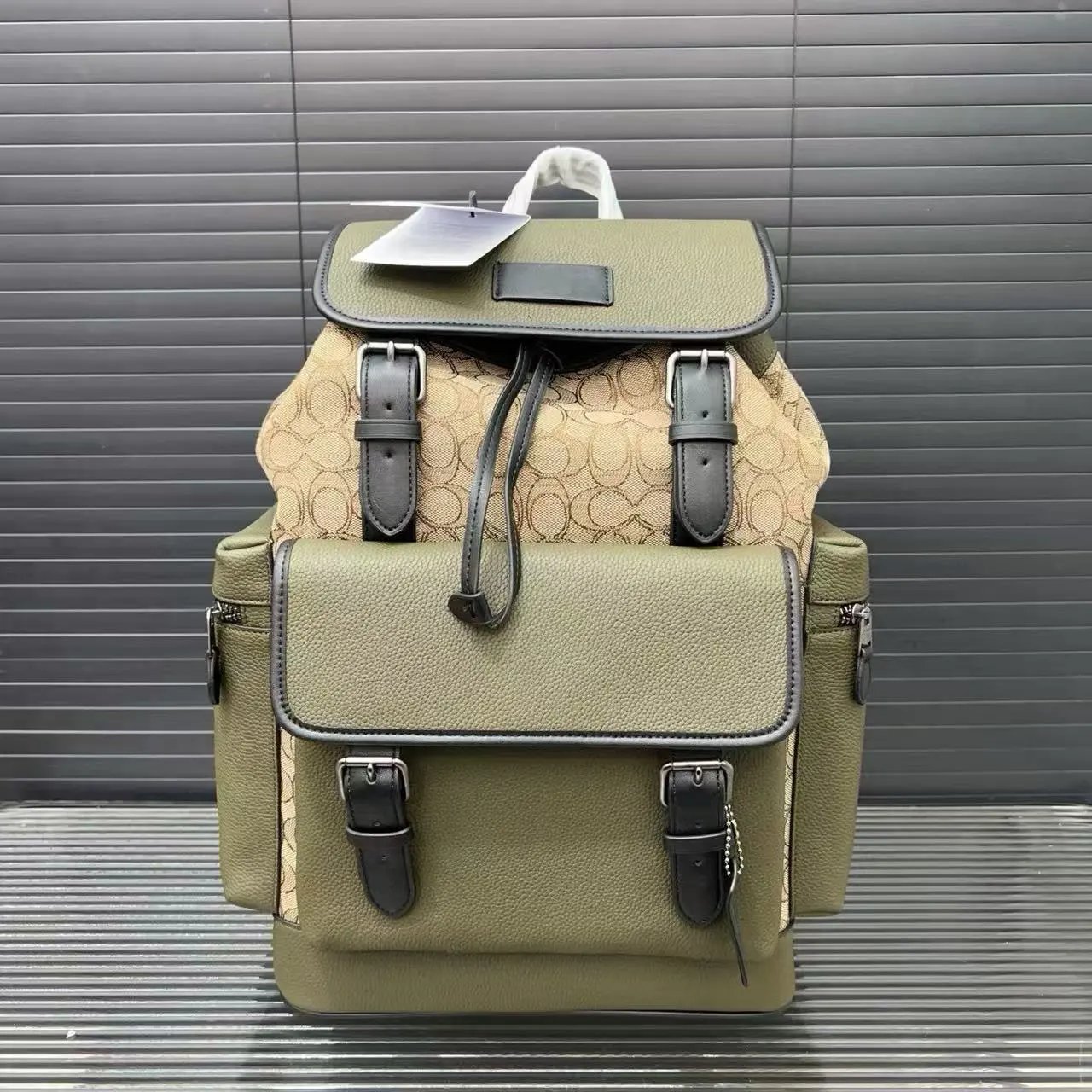 Coach Backpacks Flap backpack with buckle straps and front pocket — Style 2
