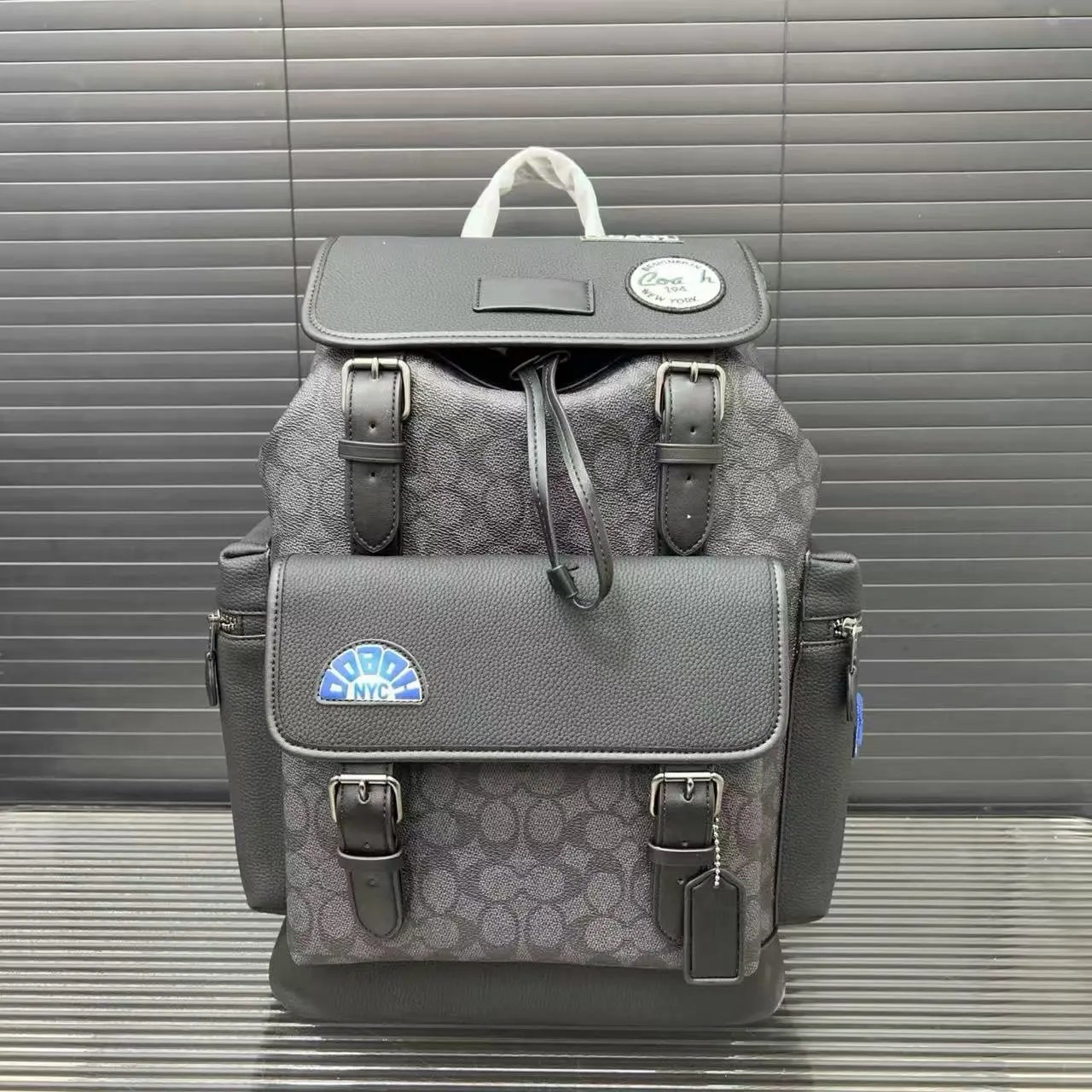 Coach Backpacks Flap backpack with buckle straps and front pocket — Style 11