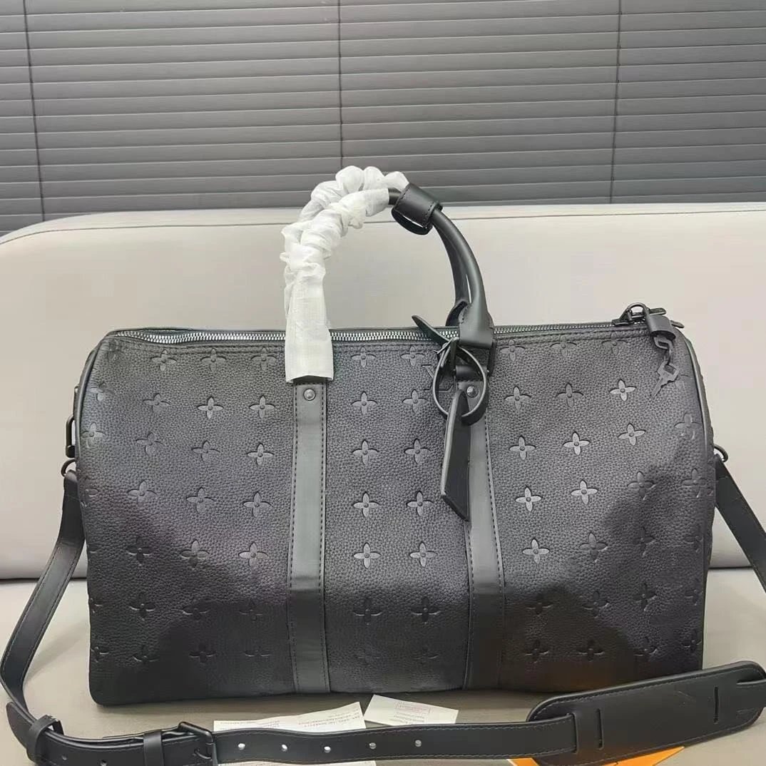 Louis Vuitton Monogram travel duffel bag — Matte lychee-pattern embossing 50cm