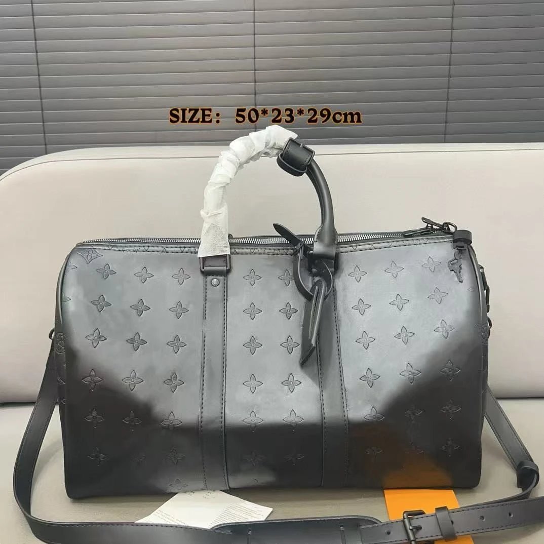 Louis Vuitton Monogram travel duffel bag — Black embossed, 50cm