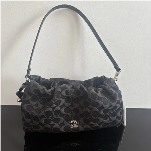 Coach Signature C canvas drawstring bag product detail image 1