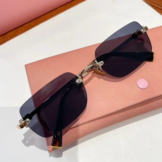 Miu Eyewear Rimless rectangular sunglasses product detail image 14