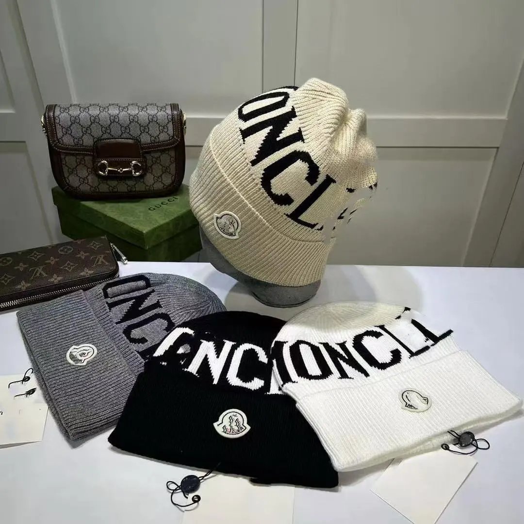 Moncler Hats Knitted logo-letter beanie image 1