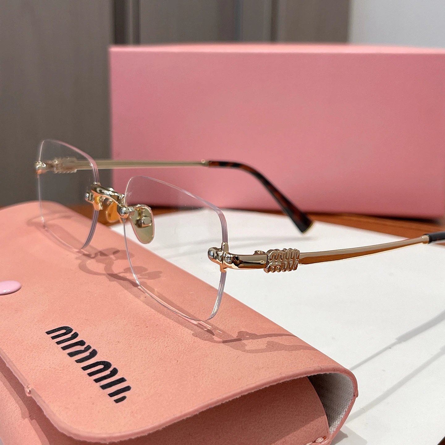 Miu Eyewear Rimless rectangular sunglasses product image