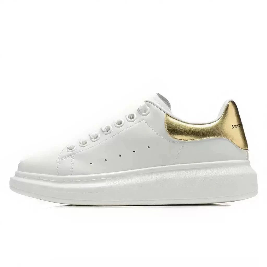 Alexander McQueen Sneakers Oversized low-top — Golden-tailed
