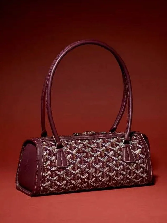 Unbranded Handbags Cylindrical baguette handbag with chevron pattern product detail image 2