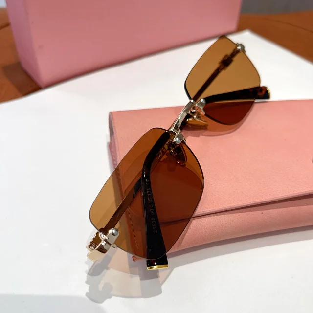 Miu Eyewear Rimless rectangular sunglasses product detail image 10