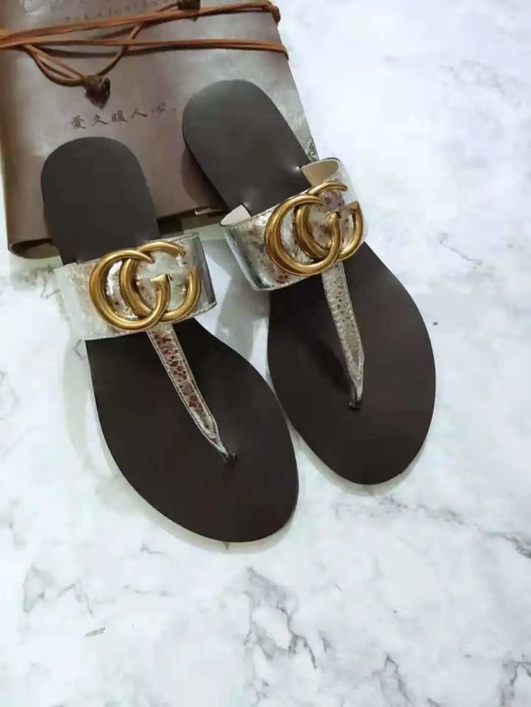Gucci Sandals Flat thong with Double G hardware — Silver