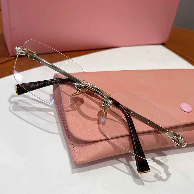 Miu Eyewear Rimless rectangular sunglasses product detail image 7