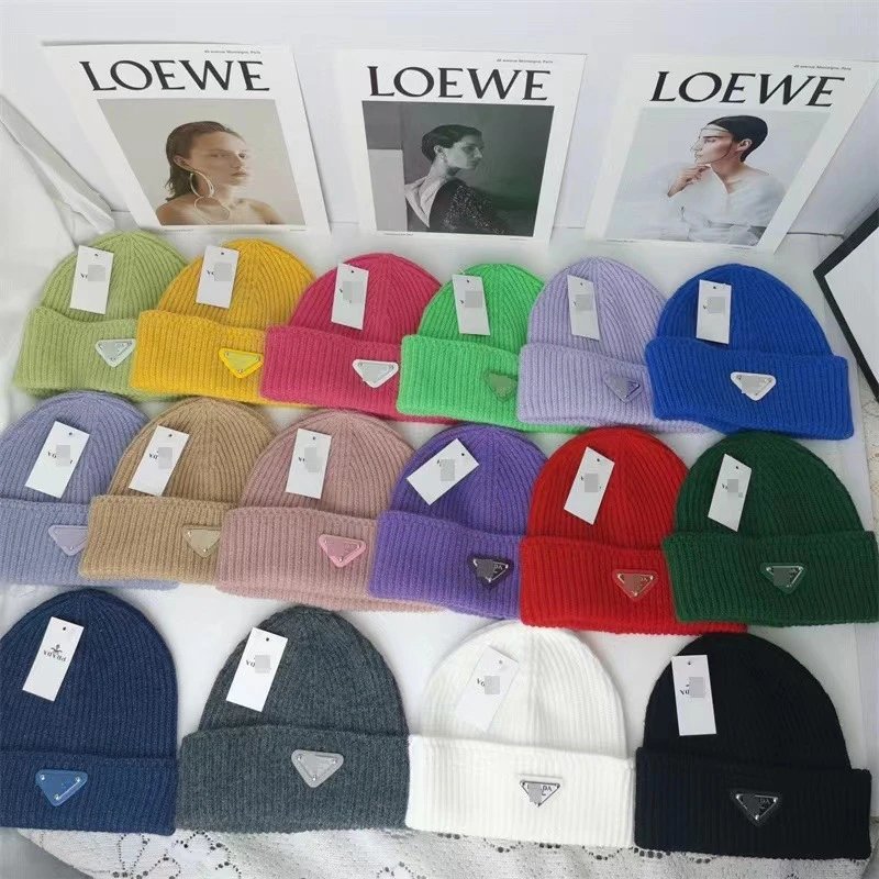 Prada Hats Ribbed Knit Beanie with Triangle Logo Plaque image 1