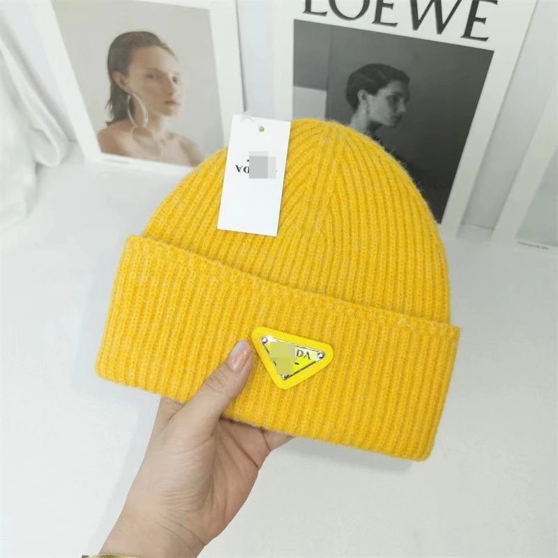Prada Hats Ribbed Knit Beanie with Triangle Logo Plaque — Yellow