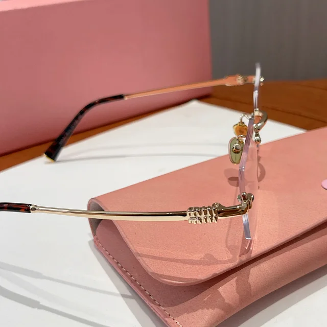 Miu Eyewear Rimless rectangular sunglasses product detail image 4