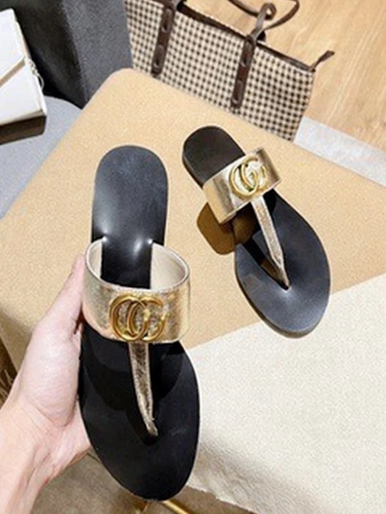 Gucci Sandals Flat thong with Double G hardware — Golden