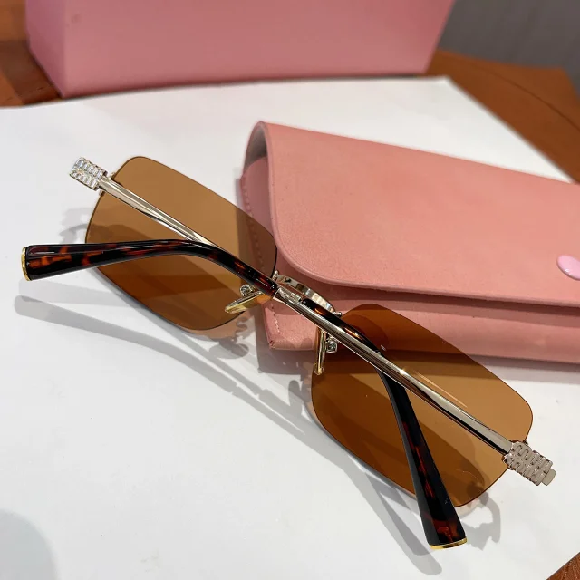 Miu Eyewear Rimless rectangular sunglasses product detail image 11