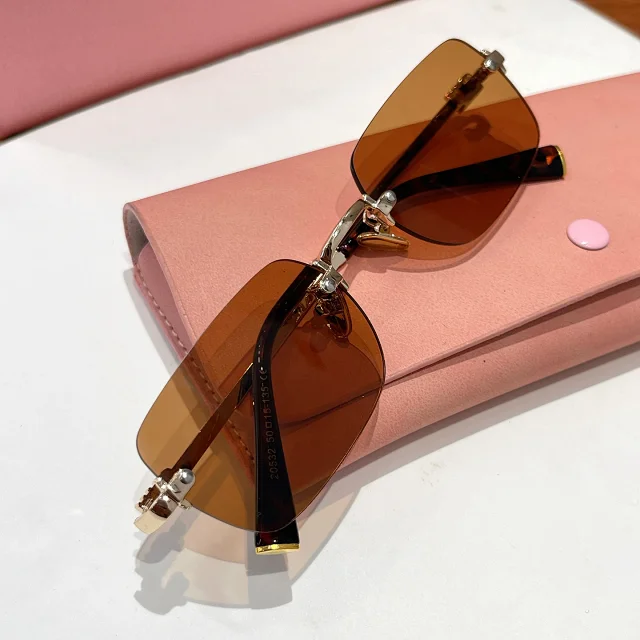 Miu Eyewear Rimless rectangular sunglasses product detail image 12
