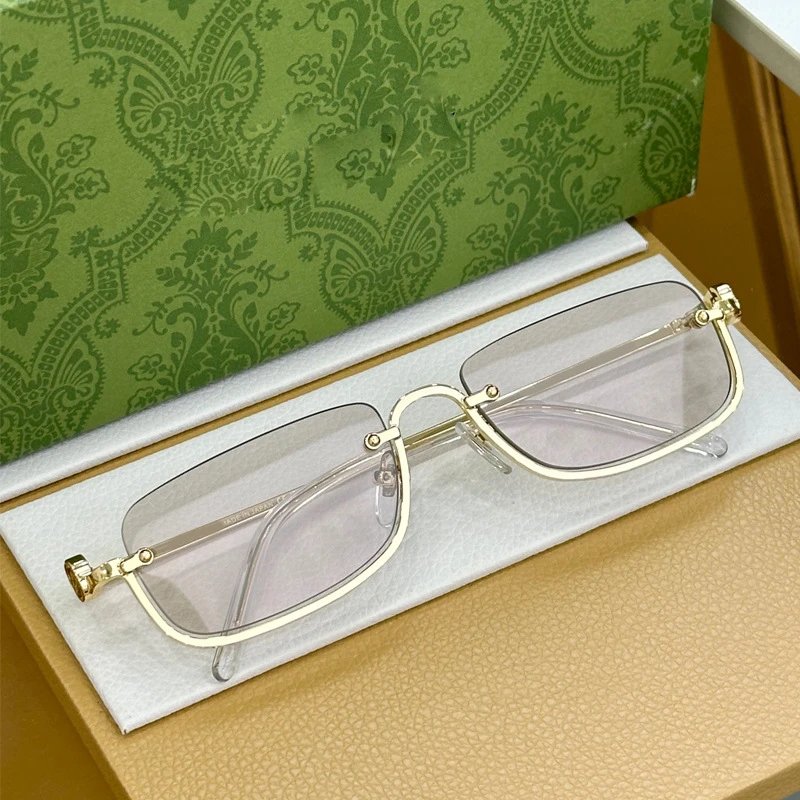 Gucci Eyewear Rectangular metal-frame sunglasses with GG-pattern lenses — through the tea color (with the original box)